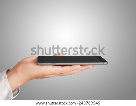 Close up hand holding smart phone 