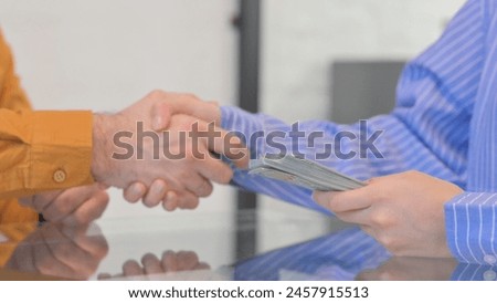 Close up of Woman Getting Paid Money, Hand Shake