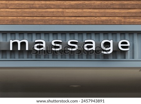 Massage signage, sign board above the beauty salon entrance 