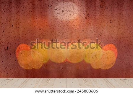 wood pine floor, water drops and defocused bokeh lights background