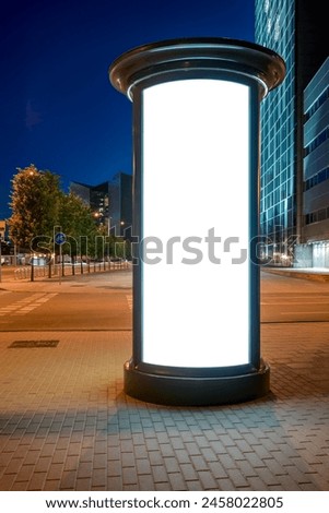 Outdoor Advertising Poster Column Mockup. Round Classic Style Billboard On City Sidewalk At Night