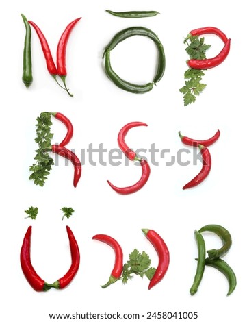 letter n o p s t u w r ō ü of green red chili pepper, salad, herbs parsley alphabetic capital letters made of chillies, vegetables and lettuce, for menu text, encyclopedia, cook book, vegan recipe