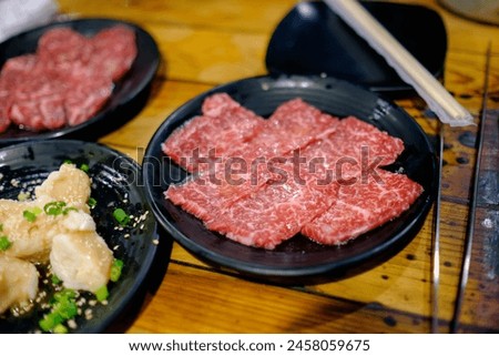 Savor the Flavor: Japanese Beef Harami Ready for Grilling on Black Tray Royalty-Free Stock Photo #2458059675