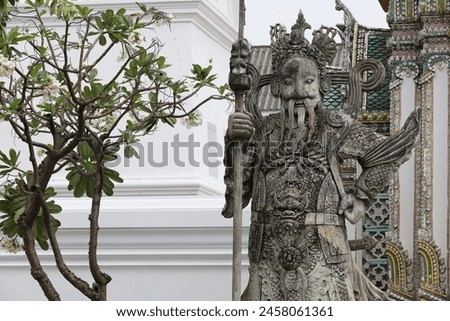 A statue in the Temple of Emerald Buddha Wat Phra Kaew