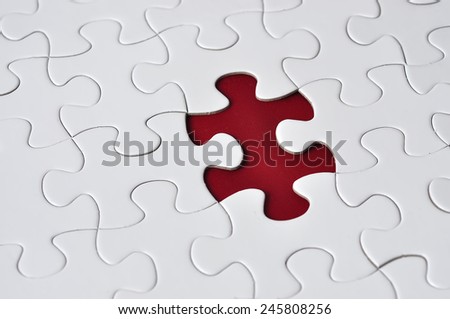 Close Up Of Missing Puzzle On Red Background, Selective Focus