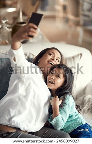 Selfie, mother and girl in home happy for social media, family memory and bonding together. Smile, parent and daughter with picture for fun on break, school holiday or relationship with love