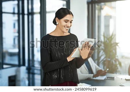 Happy woman, creative and business with tablet for research, browsing or networking at office. Female person or employee with smile for technology, online app or productivity for startup at workplace