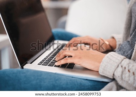 Laptop, hands and woman typing in apartment for online research with work from home creative job. Technology, keyboard and female freelance copywriter with website or internet project in house.