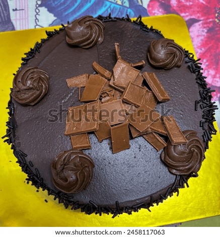 selective focus picture of dark chocolate truffle cake 