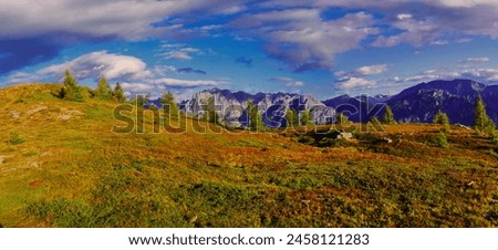 View on Lienzer Dolomiten mountains in the Osttirol region on a summer late afternoon,mountains, jagged rocks, sky, clouds.  Alps, Austria.  Royalty-Free Stock Photo #2458121283