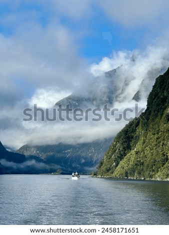 Milford Sound, New Zealand - April 20, 2024: Landscape photography of Milford Sound, Piopiotahi fjord, New Zealand.