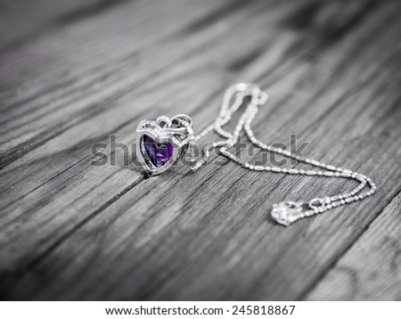 Valentines Day background with Romantic necklace with red heart 