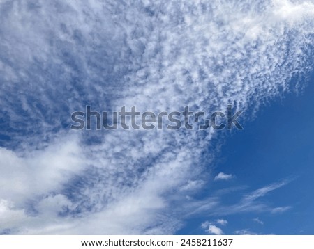 photo of blue sky and white clouds in Indonesia