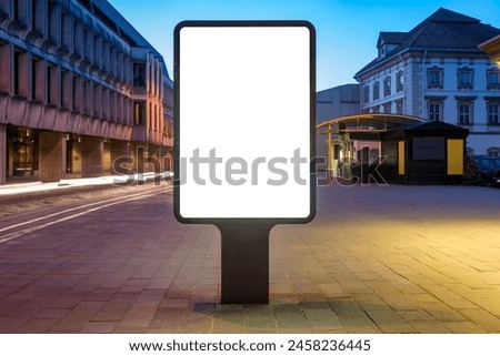 Mockup Of An Outdoor Poster Billboard On A Street Sidewalk At Night. Blank Advertising Lightbox In Front Of Car Light Trails