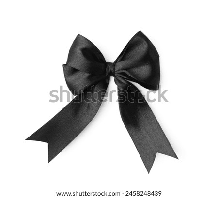 Black satin ribbon bow isolated on white, top view