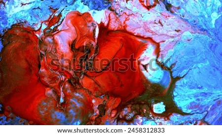 The painting depicts a vibrant scene with a mix of red, blue, and green hues, showcasing a dynamic climate and mood. Royalty-Free Stock Photo #2458312833