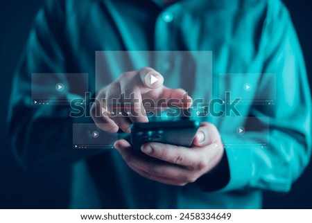 Businessman watching online live stream, live streaming video on internet, digital multimedia player concept.