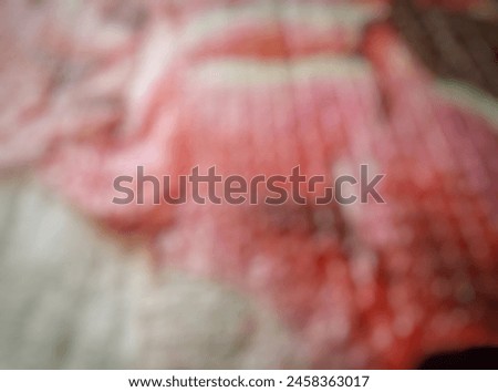 Bokeh. Closeup of the texture motif of a mat or carpet