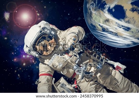 Astronaut and deep space. Science theme.  The elements of this image furnished by NASA.

