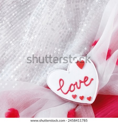 Heart-shaped White Gingerbread. I love you inscription. Shiny White Background, Sequins, Valentine's Day Concept