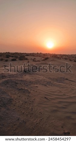 A very beautiful picture of sunset taken in huge dunes located in south of Pakistan.
The view is very beautiful and relaxing environment.
This picture represent how beautiful the south Pakistan is.   