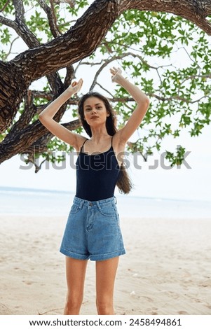 woman nature alone vacation hanging lifestyle smiling relax tree sky sea