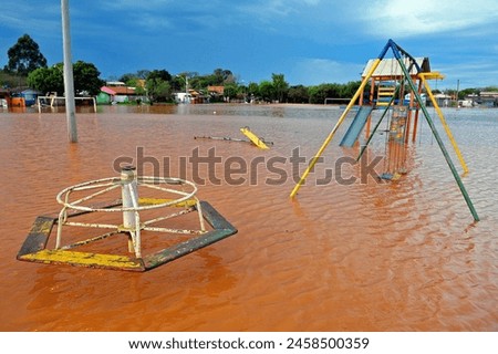 Flooded playground equipments in Porto Alegre, Rio Grande do Sul, Brazil Royalty-Free Stock Photo #2458500359
