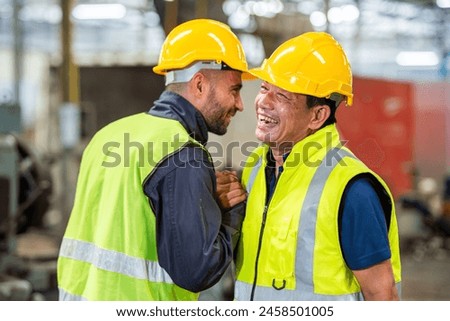 greeting by handshake touch fist and elbow of two engineer supervisor partnership in old factory. foreman greeting friend for good friendship colleague laborer in teamwork factory. Royalty-Free Stock Photo #2458501005