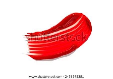 Cherry red colored make up cosmetic lip gloss isolated on white background