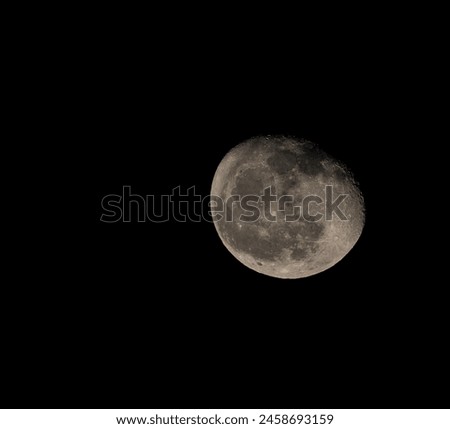 picture of a semi full moon