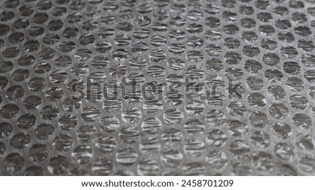 Used Bubble Wrap Sheet Angle View Textured Stock Photo. Package Material Backgrounds
