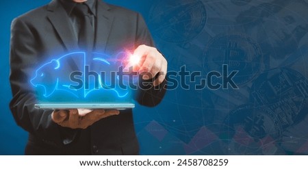 Growing stock market. Bullish and Bearish market trading up and down trend of graph. Business and financial concept. Businessman showing glowing neon line of bull and bear icon.