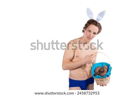 Attractive young guy in a bunny costume for Easter.