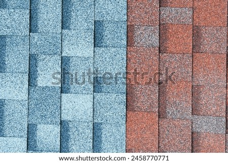 It's close up view of mosaic colorful tile. It is photo of the blue and a brown roof tiles. It is view of multicolored texture of tiles.