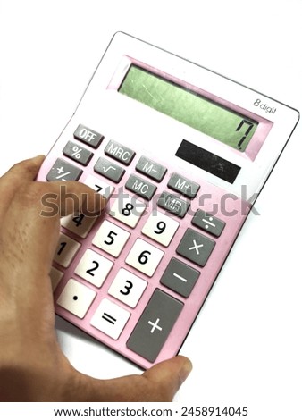 women hand using a Pink electronic calculator 8 digit battery operated isolated in white background 
