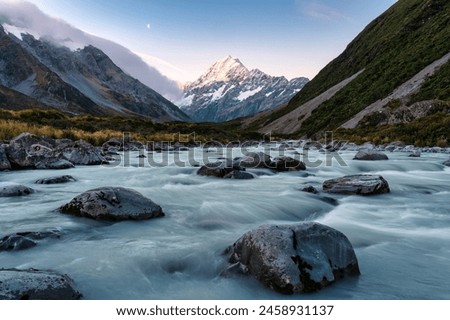 Beautiful landscape of Hooker valley track with Mt Cook or Aoraki and hooker lake flowing in national park on the evening at New Zealand Royalty-Free Stock Photo #2458931137