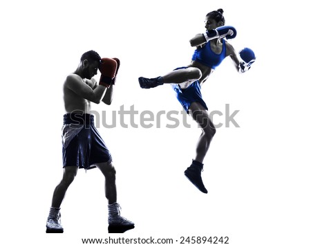 one woman boxer boxing one man  kickboxing in silhouette isolated on white background