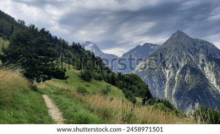 Les Deux Alpes. The French alps, place to hike.Beautiful picture of summer mountains. Cloudy day on the hill next to the mountain. Photo for calendar. Mountains in summer. Hiking in France.