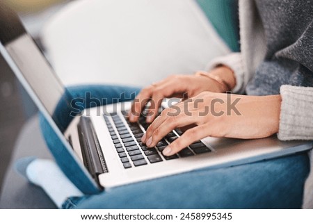 Laptop, hands and person typing in apartment for online research with work from home creative job. Computer, keyboard and freelance copywriter with website or internet project for career in house.