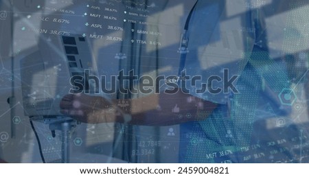 Image of financial data processing over delivery man loading connections. Global finances business digital interface and technology concept digitally generated image. Royalty-Free Stock Photo #2459004821