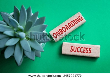 Onboarding Success symbol. Concept word Onboarding Success on wooden blocks. Beautiful green background with succulent plant. Business and Onboarding Success concept. Copy space
