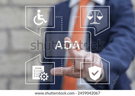 Business man working on virtual touch screen presses abbreviation: ADA. ADA Americans with Disabilities Act concept. Disability Law Social Services.