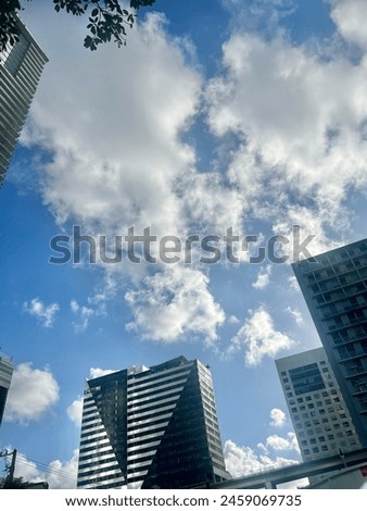 Tall buildings of the Brickell, Miami skyline on a partly cloudy day