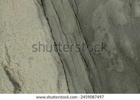 The patterns and textures in the stone create abstract shapes. Abstract shapes and patterns of river rock surfaces. For graphic design or 3D rendering