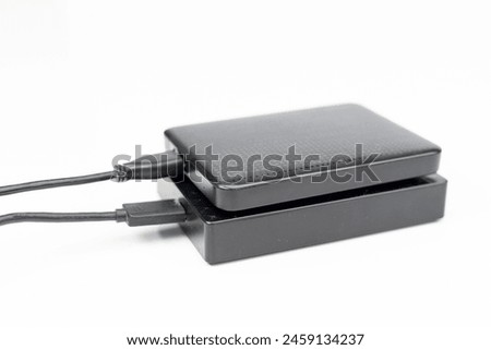 External hard disk drives connected to computer for backup data isolated on white background