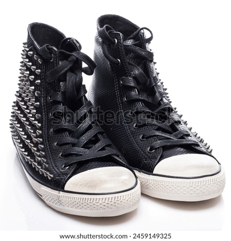 Fashion. Black gumshoes on the white background Royalty-Free Stock Photo #2459149325