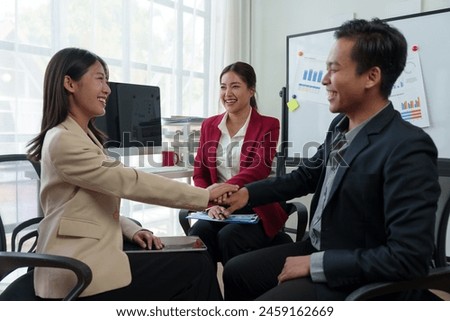 Business team congratulates on success Businessman presents marketing plan Receive praise from your team mates. Clap your hands in congratulations in the conference room. Success concept. Royalty-Free Stock Photo #2459162669