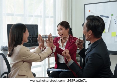Business team congratulates on success Businessman presents marketing plan Receive praise from your team mates. Clap your hands in congratulations in the conference room. Success concept. Royalty-Free Stock Photo #2459162671