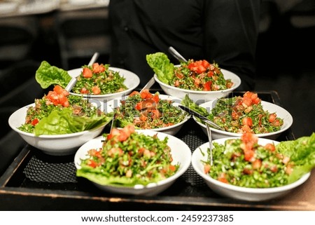 A diverse assortment of delectable dishes elegantly presented on a table. Royalty-Free Stock Photo #2459237385