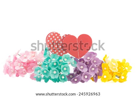 Pastel artificial flowers with Valentine Hearts on White Isolate background